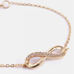 Women Gold-Toned & White Brass Crystals Handcrafted Gold-Plated Link Bracelet